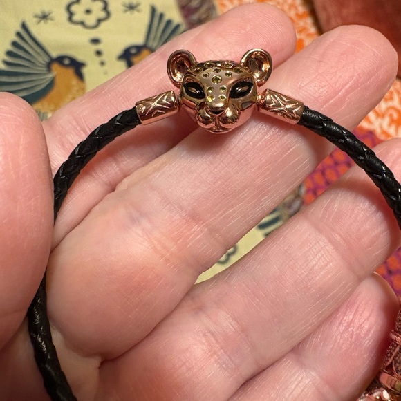 Pandora black braided bracelet with rose gold plated lioness clasp and 9 charms - Picture 3 of 5